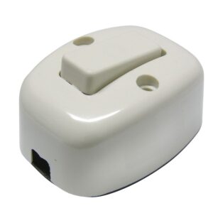 Apagador sencillo visible ovalado, línea de sobreponer, color marfil Surtek